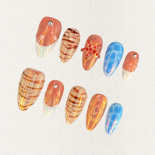 Fiery Glow press-on nails showcasing black and orange flame patterns, delivering a powerful and striking look.