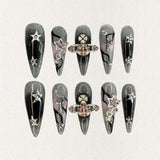 Celestial Voyage nail set features a shimmering gray base with celestial elements like stars and planets, adorned with intricate metallic and gemstone accents for a galactic aesthetic.