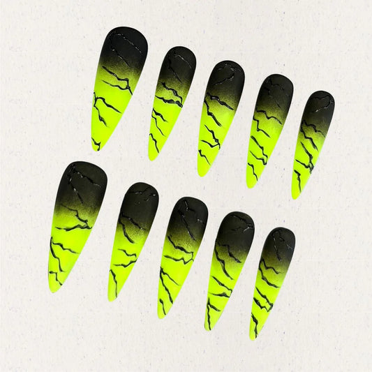 Electric Surge nail set includes neon green and black gradients with bold lightning effects, offering a dynamic and energetic appearance.