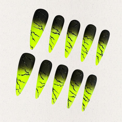 Electric Surge nail set includes neon green and black gradients with bold lightning effects, offering a dynamic and energetic appearance.