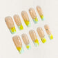Morning Dew nail set features a subtle nude base with glowing yellow and green gradients, resembling the soft light of early morning. Accented with delicate crystal drops, this design evokes the freshness and purity of dew-drenched flowers at sunrise.