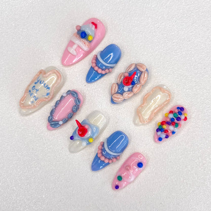 Candyland Dreams press-on nails with colorful beads and pastel accents, inspired by playful candy themes for a sweet, joyful vibe.