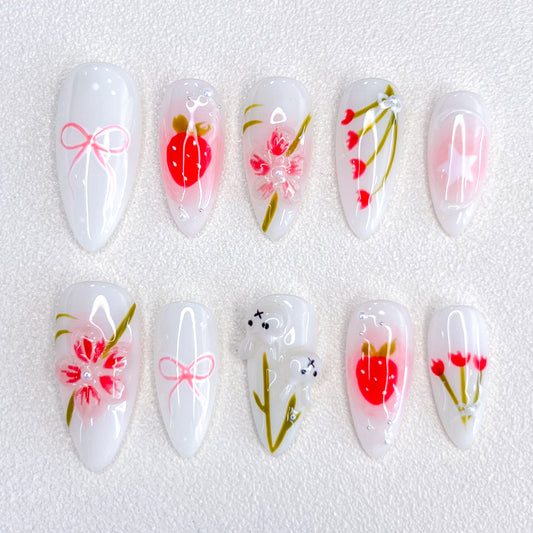 Cherry Blossom Bliss press-on nails with soft pink tones and cherry blossom designs, evoking the beauty of springtime.