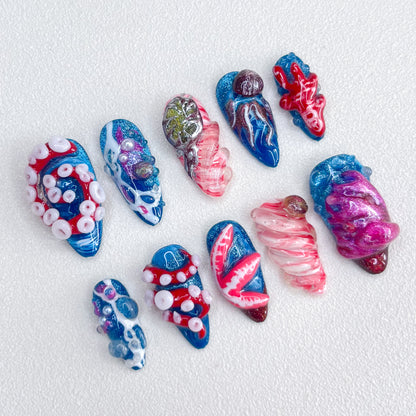 Underwater Whimsy press-on nails with vibrant ocean elements and whimsical designs, capturing the spirit of the sea.