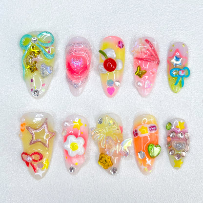 Sweet Carnival press-on nails with candy themes and bright, playful designs for a cheerful aesthetic.