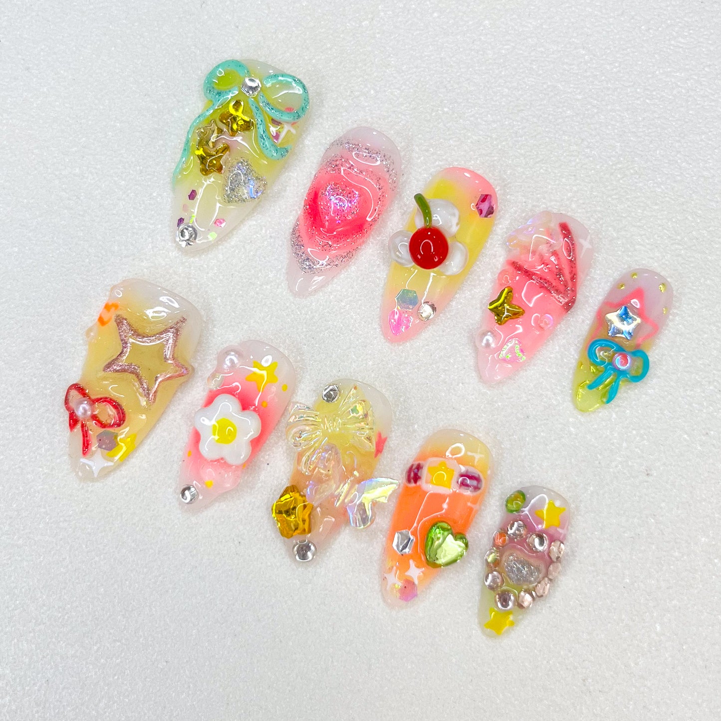 Sweet Carnival press-on nails with candy themes and bright, playful designs for a cheerful aesthetic.