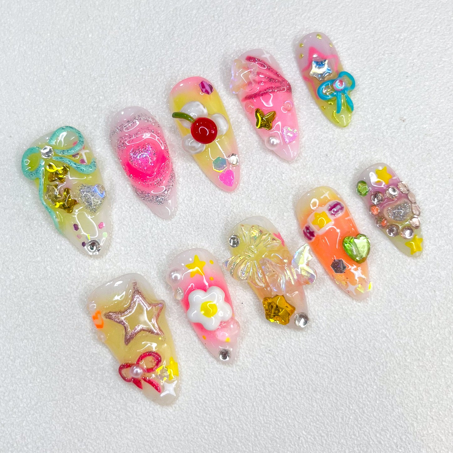 Sweet Carnival press-on nails with candy themes and bright, playful designs for a cheerful aesthetic.