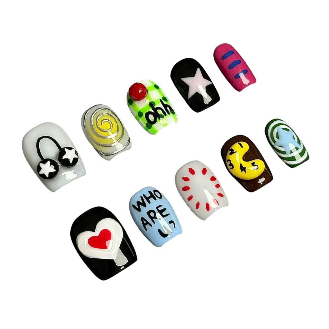 A press-on nail set with pop-art-inspired graphics, playful text, and colorful abstract designs, offering a bold and expressive style.