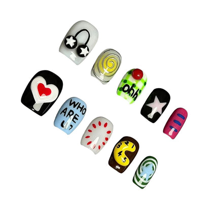 A press-on nail set with pop-art-inspired graphics, playful text, and colorful abstract designs, offering a bold and expressive style.