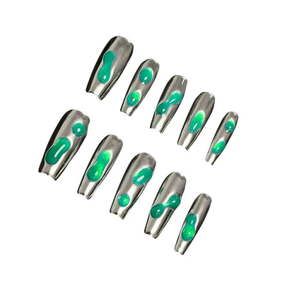 A set of metallic silver press-on nails with hand-painted green liquid-like patterns, showcasing a futuristic, high-tech nail design perfect for bold, statement-making looks.