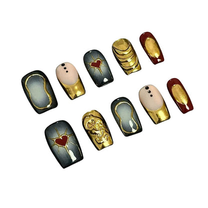 A set of luxurious press-on nails featuring gold accents, red heart motifs, and vintage-inspired designs, combining black, gold, and red hues for an elegant and regal look.