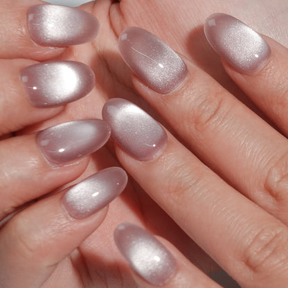 A set of lilac - colored glossy press - on nails neatly arranged in a transparent case. The nails have a soft, smooth finish, ideal for creating a refined and graceful appearance, suitable for spring or elegant occasions.