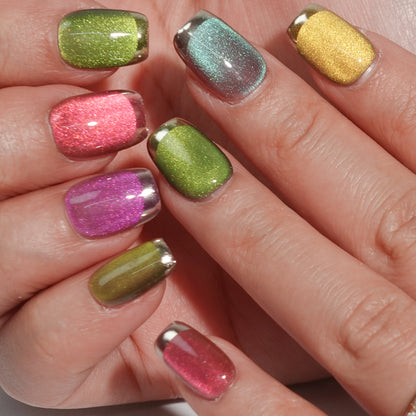 A set of multicolored glittery press - on nails neatly arranged in a transparent case. The nails feature a variety of bright colors with a sparkling finish, ideal for adding a festive and cheerful touch to your look, perfect for parties or celebratory events.