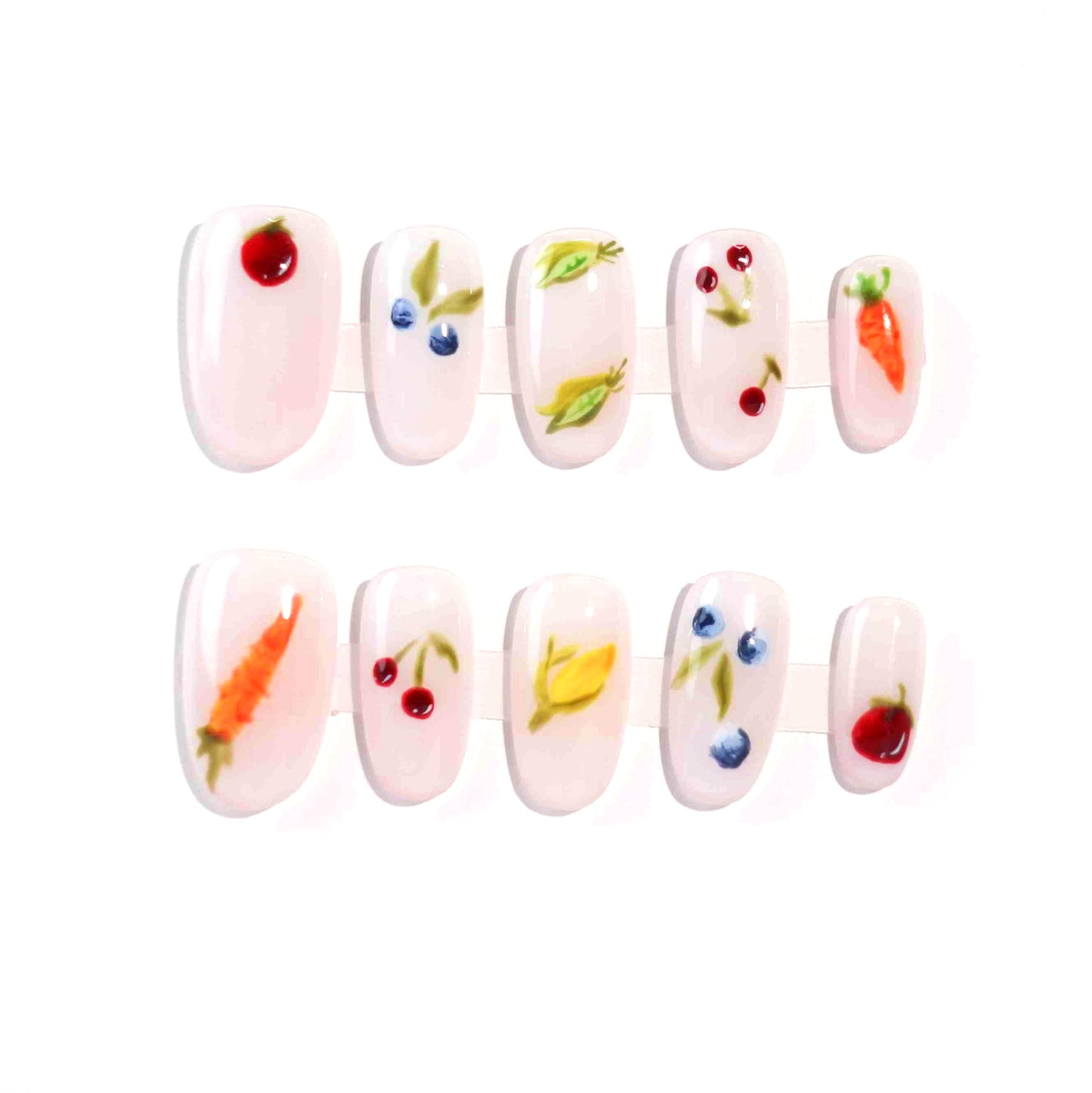 A set of press - on nails with colorful fruit illustrations including cherries, blueberries, carrots, lemons, and peas. The nails have a fresh and lively appearance, ideal for summer outings or fruit - themed parties.