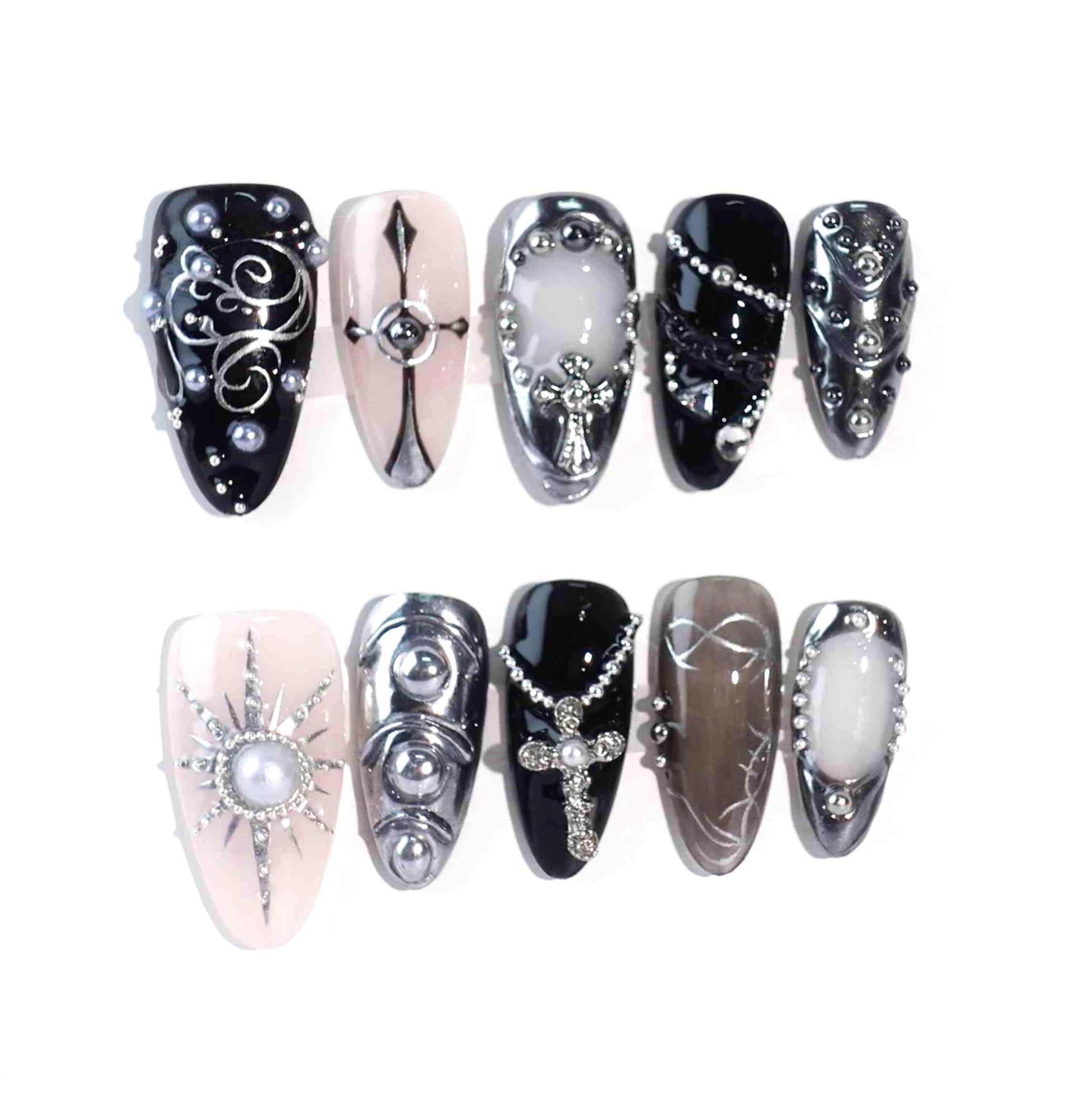 Press - on nails featuring dark hues, silver star - like accents, and a design that combines elements of Gothic style.