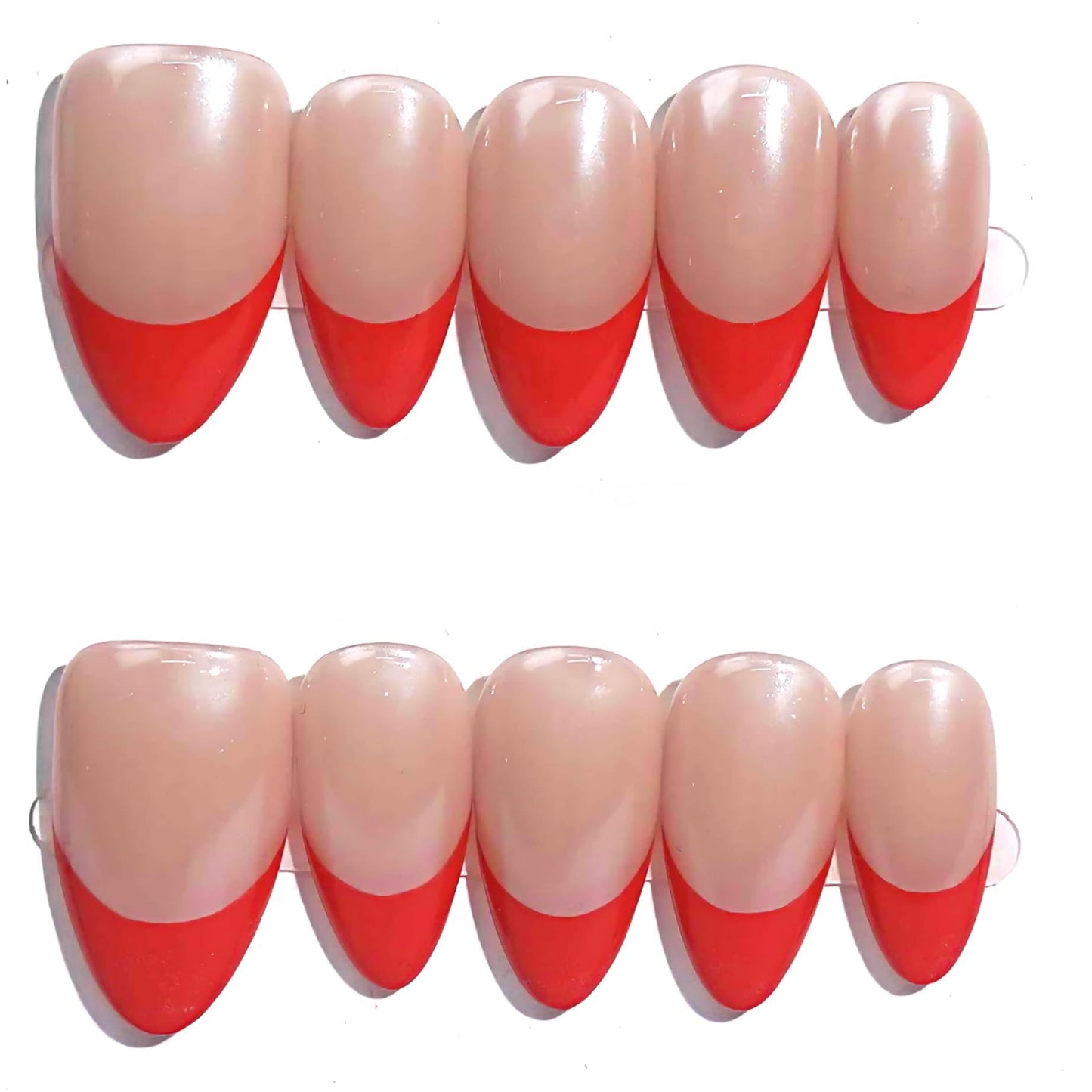 Crimson Chic nail set highlights vibrant red French tips on a neutral base, offering a timeless yet contemporary aesthetic.