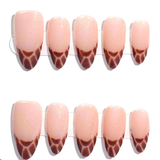 A sophisticated press-on nail set showcasing nude pink bases with deep brown French tips in a subtle leopard print pattern. This design exudes a balanced combination of chic refinement and untamed allure, ideal for adding a touch of wild charm to your look.