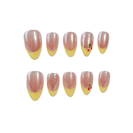 Press-on nails featuring a shimmering pink base, sunny yellow tips, and a charming cherry design, perfect for a cheerful and stylish vibe.