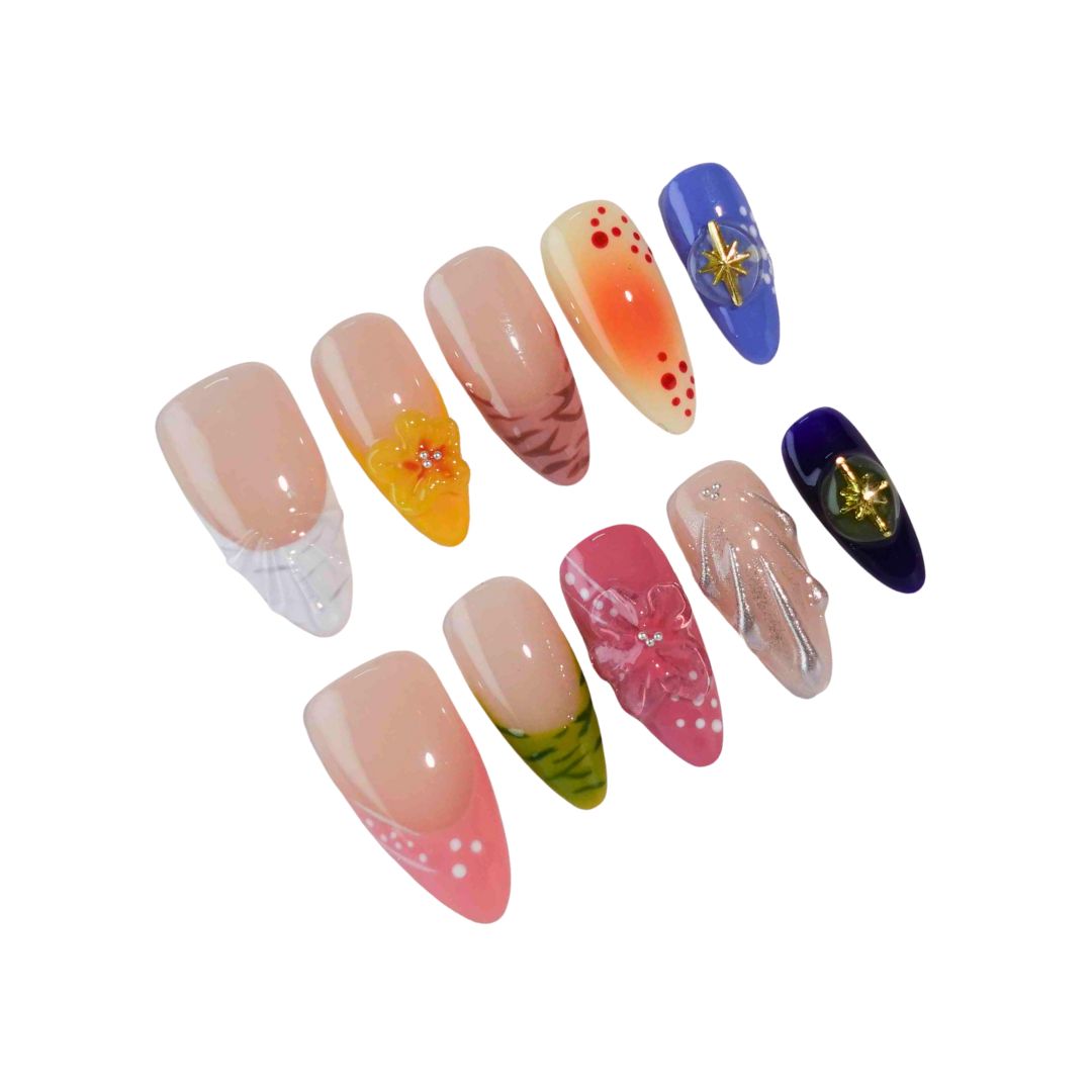 A stunning collection of press-on nails featuring intricate floral motifs, warm gradients, and elegant embellishments like gold stars and shimmer accents. Perfect for showcasing a mix of natural beauty and bold style.